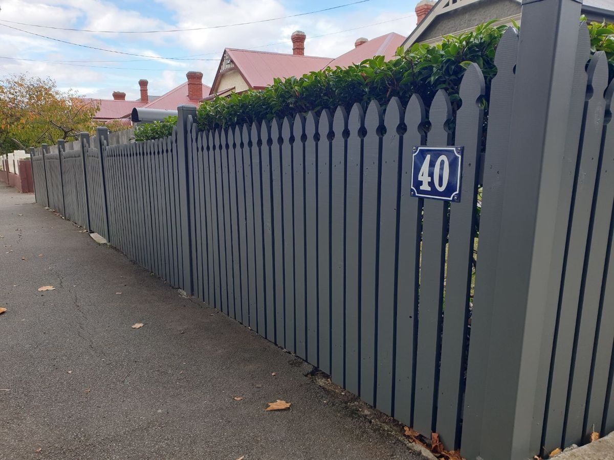 Painted picket front fence
